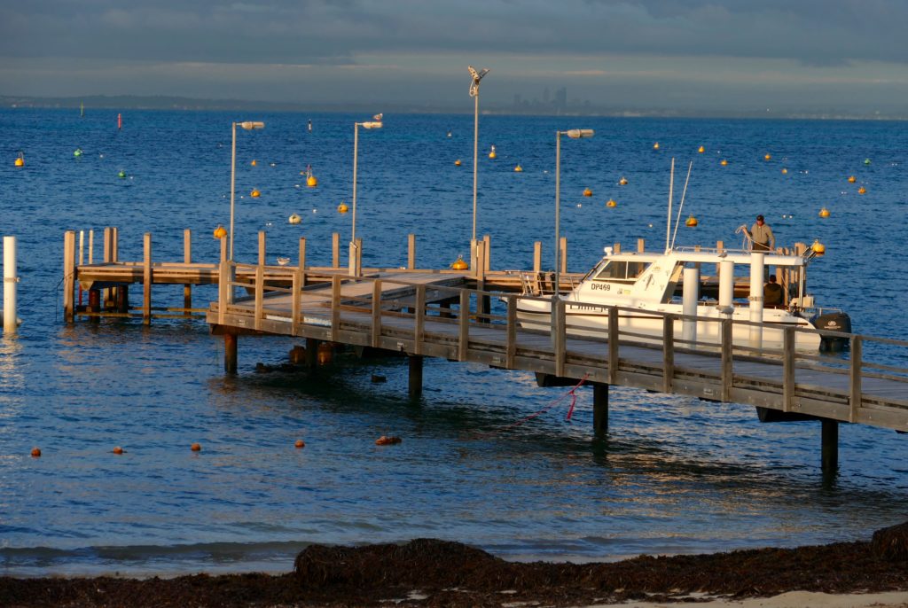 Just before sundown, view from Hotel Rottnest across to Perth. Copyright Doug Spencer.