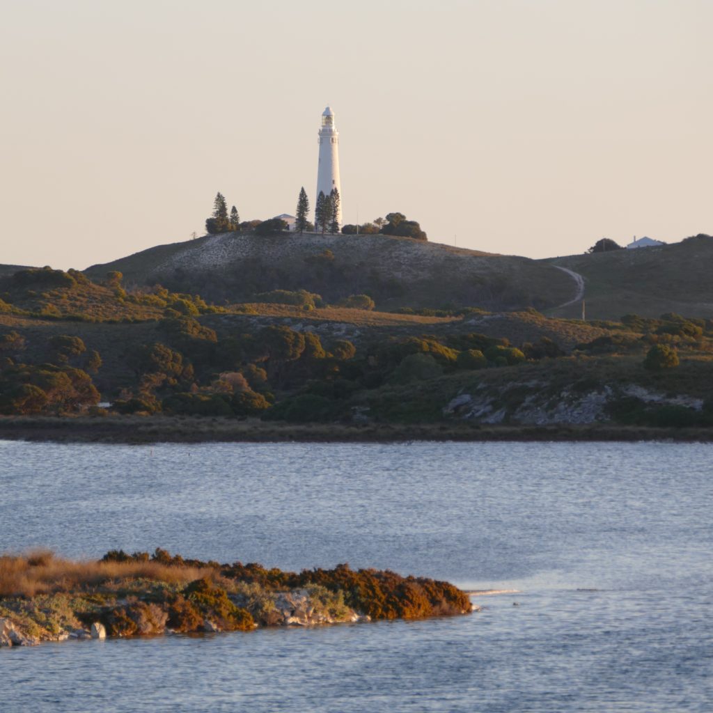 Salt lakes in foreground. The southern shore of Rottnest is over the far side side of Wadjemup Lighthouse.